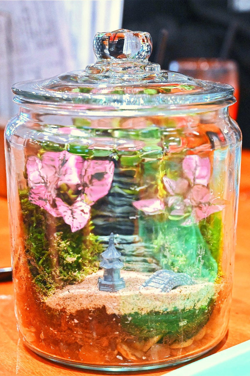 Glass jar with decorative elements on a table