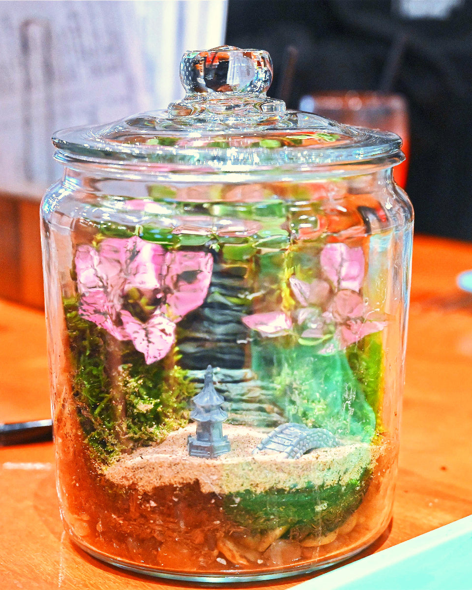 Glass jar with decorative elements on a table
